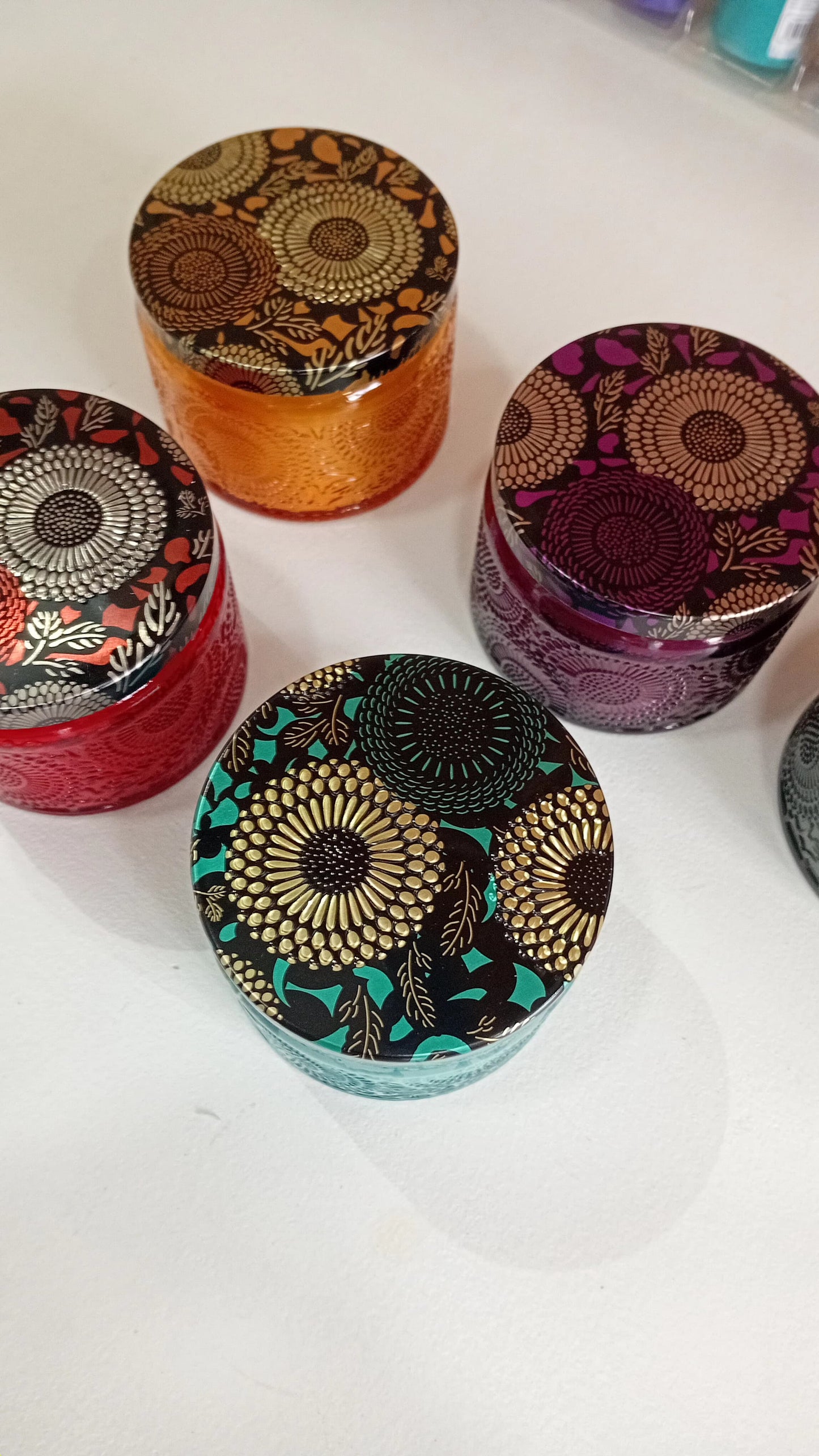 Velas Aromáticas con frascos de colores