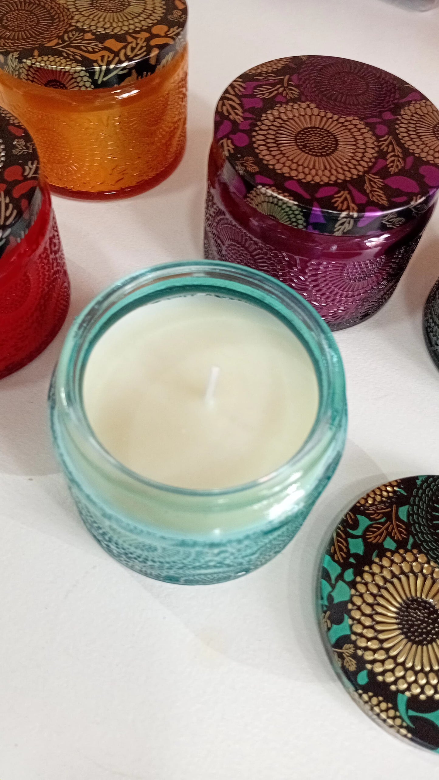 Velas Aromáticas con frascos de colores